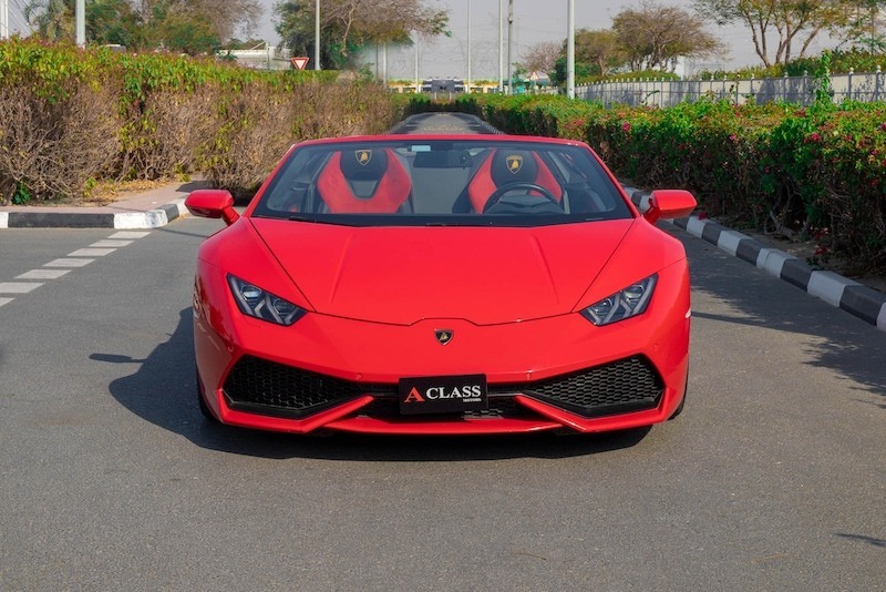 Second hand Lamborghini price in Dubai displayed with a luxury model